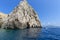 Blue Cave carved in the limestone by the Adriatic Sea, tourists sailing by boat to the grotto, Bisevo Island, Croatia