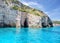 Blue Caves and blue water of Ionian sea on Island Zakynthos in Greece and sightseeing points. Rocks in clear blue sea