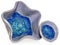 Blue, ceramic, handmade bowls in the shape of a star and round. At the bottom of vessel broken glass with bubbles of air.