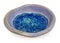 Blue, ceramic, handmade round bowl. At the bottom broken glass w