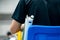 Blue chair of badminton referee with yellow colors near badminton net with blurred background in sport indoor stadium