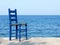 Blue chair at the sea in Greece