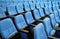 Blue chair seats in empty conference room