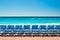 Blue chairs on the Promenade des Anglais in Nice, France