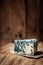 Blue cheese Gorgonzola on a rustic wooden background. Mold cheese with copyspace and dark backdrop.