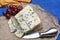 Blue cheese made from cow milk with Penicillinum mold, tasty soft cheese with specific odor