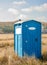 Blue chemical toilet