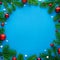 Blue christmas card with round frame decorated with festive ornaments