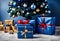 blue christmas gift parcels under a tree decorated with matching baubles