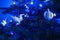 Blue Christmas lights white origami baubles