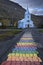 Blue Church and rainbow road in Seydisfjordur