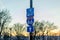 Blue Classic American Interstate 66 Street Sign. Directional Symbol, Arrow Pointing to West in Washington DC at Sunset.