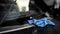 Blue cloth wipe or cleaning rag on car front windscreen
