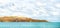 Blue clouded sky, clear sea water, panoramic skyline, sea-gulls, coast view from a sea.