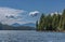 Blue cloudscape over forests and water, Ketchikan, Alaska, USA