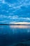 Blue cloudscape over lake