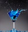 Blue cocktail splashing