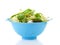 Blue colander with fresh lettuce