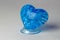 Blue Cold Heart Club close-up. As a symbol of inaccessibility.