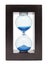 Blue color hourglass on white