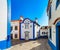 Blue color on the sky and buildings of old city Ericeira