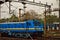 A blue colored electric rail engine of Indian Railway