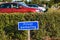 Blue colored sign with information in Swedish PRIVAT PARKERING at the entrance of car park