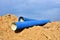 Blue concrete drainage pipes at the construction site. Laying of underground storm sewer pipes. Installation of water main,