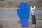 Blue construction glove and wrench