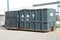 blue container large rental temporary mobile transport dumpster bin with doors. p