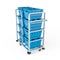 Blue containers stacked on a transportation cart