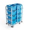 Blue containers stacked on a transportation cart