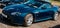 A blue convertible Aston Martin V8 Vantage