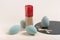 blue cosmetic makeup sponge on a beige background. A set of sponges of different shapes. Tool