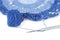 Blue crochet napkin with thread ball isolated