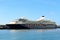 Blue cruise ship at anchor in the harbor