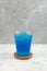 Blue Crushed ice or snow slush with tapioca pearls in disposable plastic cup. Bubble tea. Refreshing summer iced drink. Take away