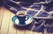 Blue cup of the coffee and vintage scarf.