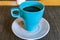 Blue cup of pot with black coffee on Mallorca Spain