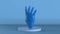 Blue cyborg hand on blue background