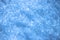 Blue defocused snow texture. Bright spotted bokeh