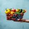 Blue delight Hand holding shopping cart with vibrant fruits and vegetables