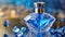 Blue diamond crystal glass perfume bottle. Luxury fragrance. Mock-up