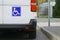 Blue disability sign on minivan back door