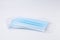 Blue disposable surgical face mask. Mask medical for protective coronavirus place stacks isolated