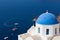 Blue dome and church bells, Santorini.