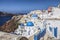 Blue domed churches in the village of Oia, Santorini Thira, Cyclades Islands, Aegean Sea