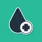 Blue Donate drop blood with cross icon isolated on green background. Vector