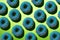 Blue donuts with pink crumb on a green background