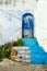 Blue Door in Chefchaouen Morocco with Cats and Stairs